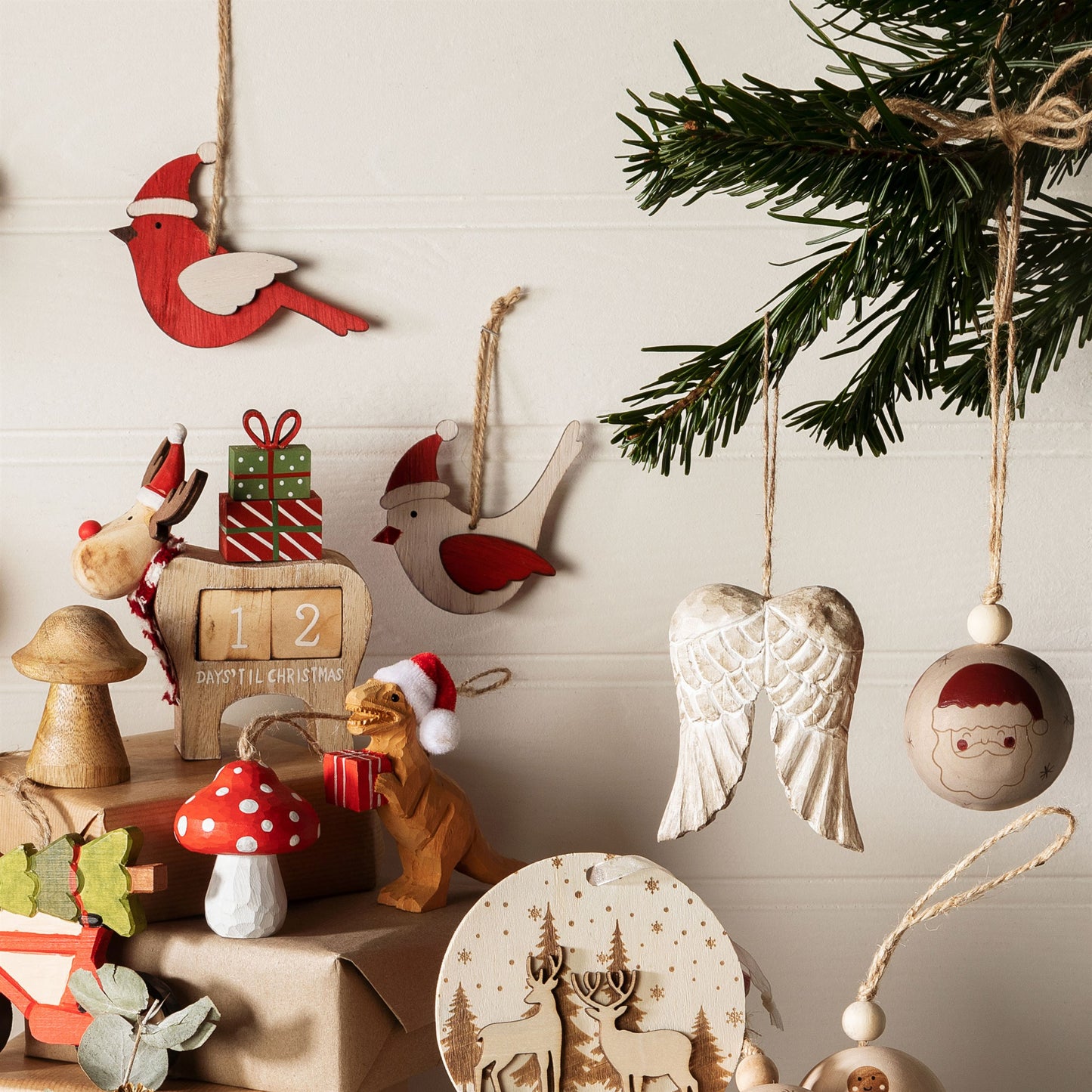 Wooden T Rex wearing Santa Hat with Gift Christmas Tree Decoration