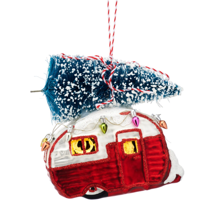 Admit it, we all secretly loved those caravan holidays as kids! Now you can bring that nostalgia back with this very cool retro, red and white caravan carrying a Christmas tree on its roof. There are even teeny, tiny Christmas lights!!!