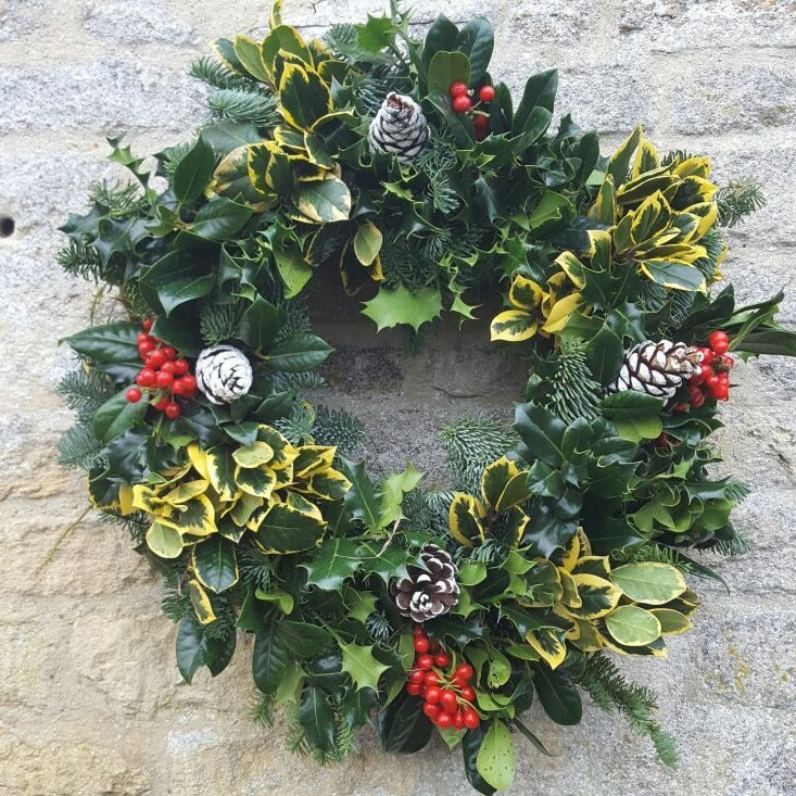 Holly and fir wreaths for sale in Cirencester, Gloucestershire