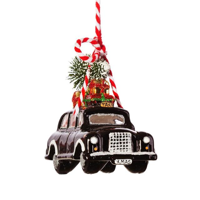 Bring a touch of the big city to the tree with this very cool London black cab carrying a Christmas tree.