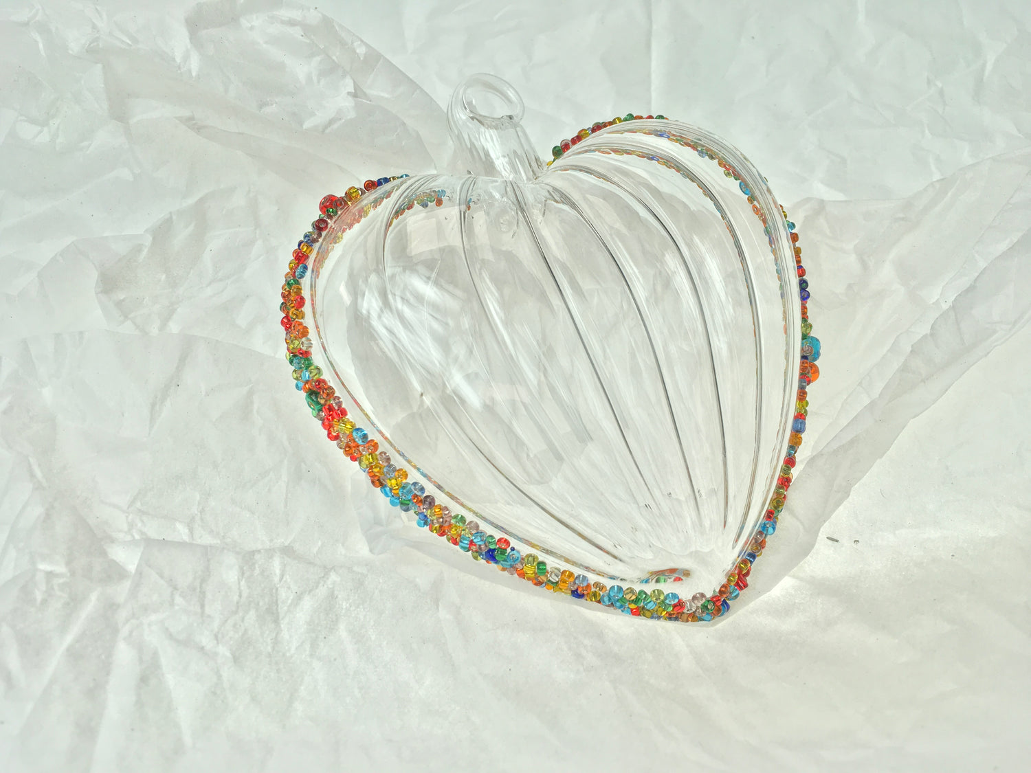 Hand-blown clear glass heart decorations with multi-coloured beads for Christmas, Valentines Day and love themed decorating