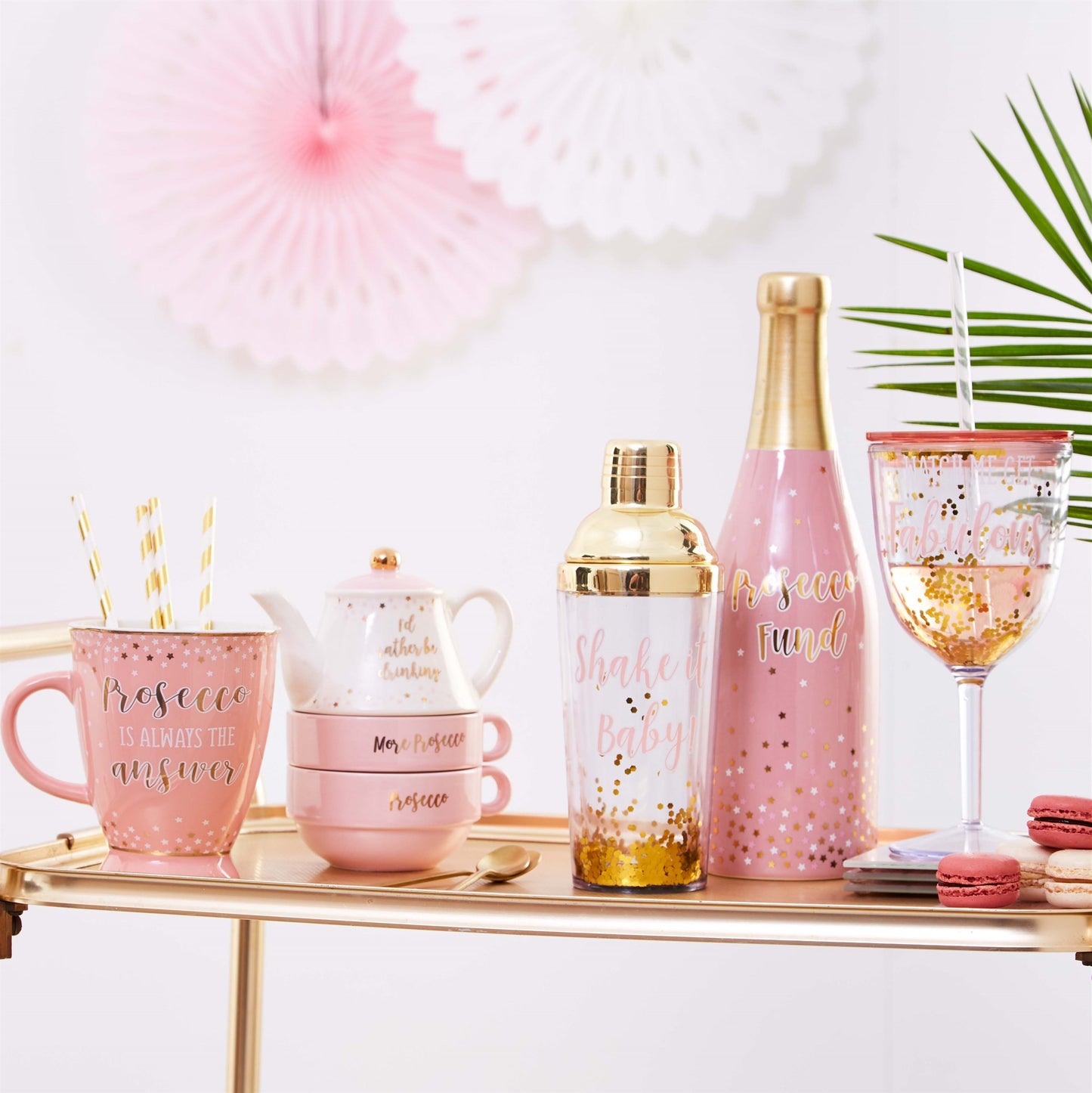 A pretty pink money bank in the form of a prosecco bottle!