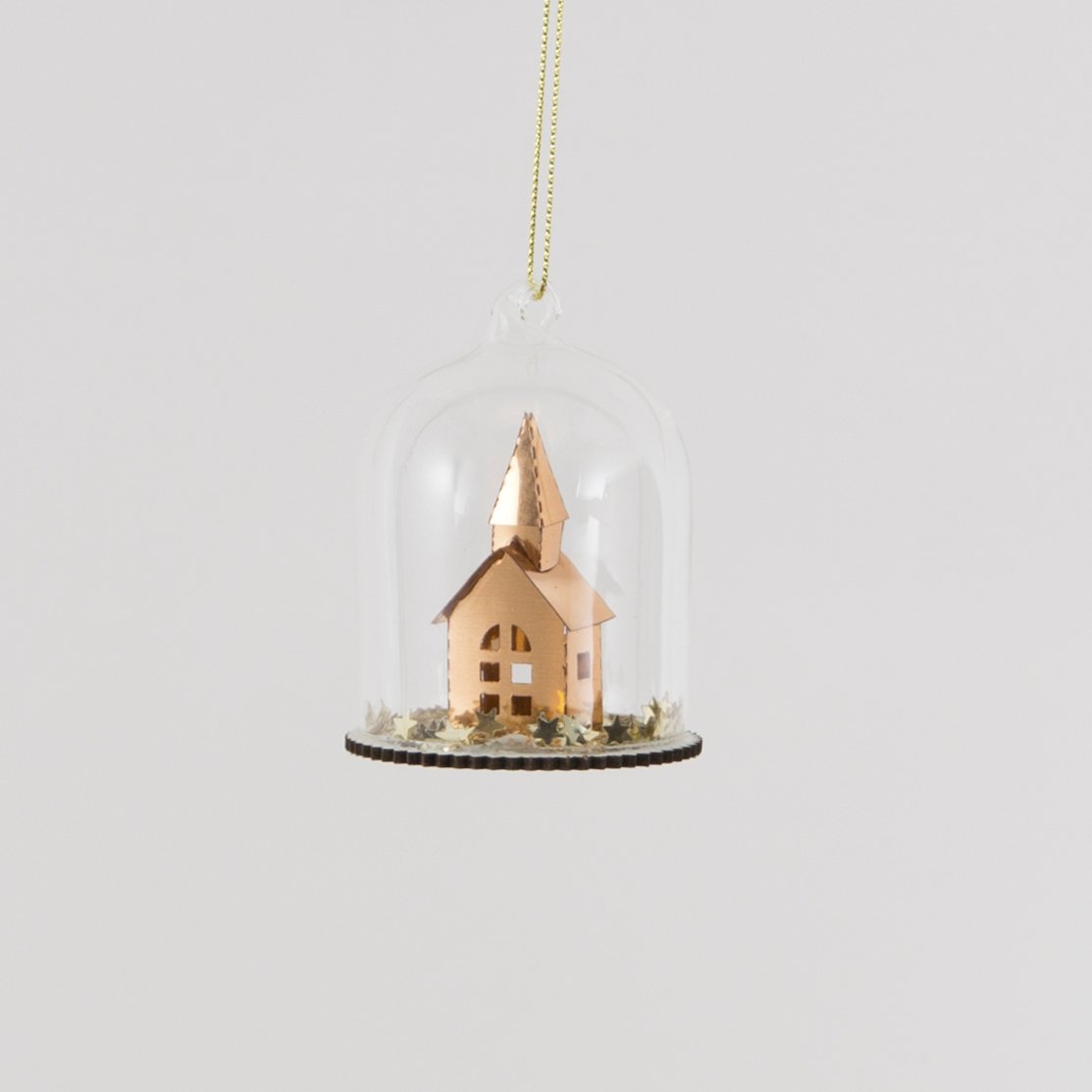 Beautiful decoration featuring a lovely church surrounded by miniature copper stars that move when shaken.