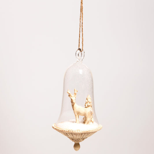 This bell-shaped glass dome is placed on an elegant cream resin base, and features a cream stag deer stood in the snow with a Christmas tree behind.