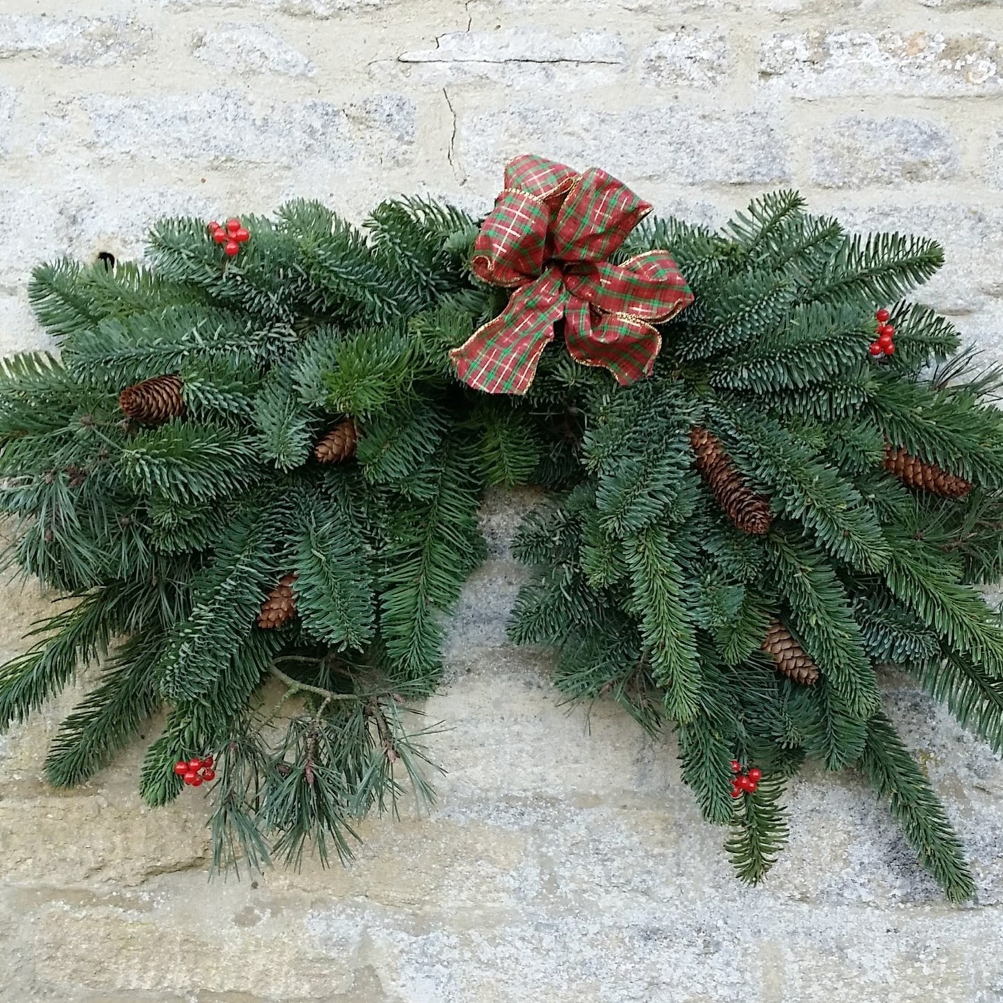 Noble Fir Mantle Corner Swag with Tartan Ribbon for hanging inside or outside walls