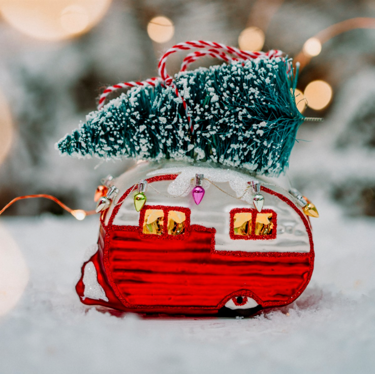 Admit it, we all secretly loved those caravan holidays as kids! Now you can bring that nostalgia back with this very cool retro, red and white caravan carrying a Christmas tree on its roof. There are even teeny, tiny Christmas lights!!!