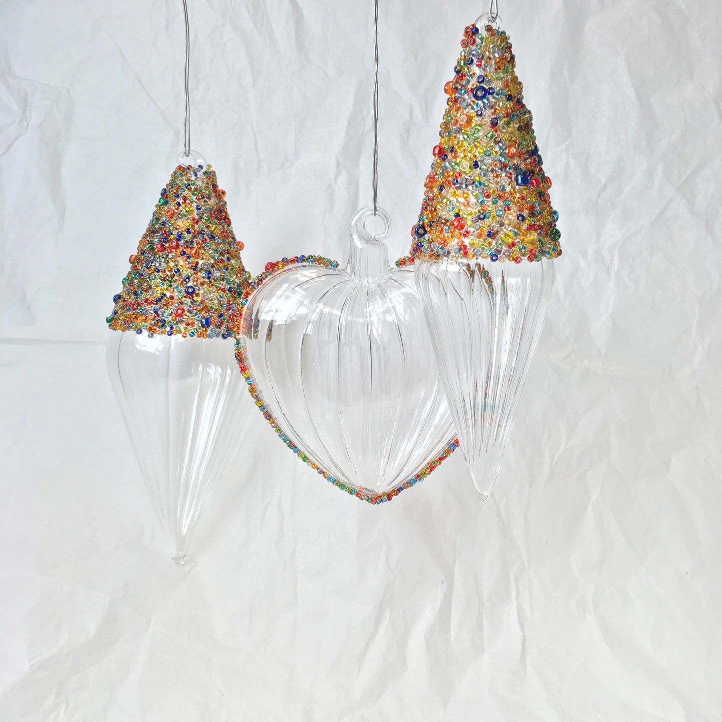 Hand-blown clear glass heart decorations with multi-coloured beads for Christmas, Valentines Day and love themed decorating