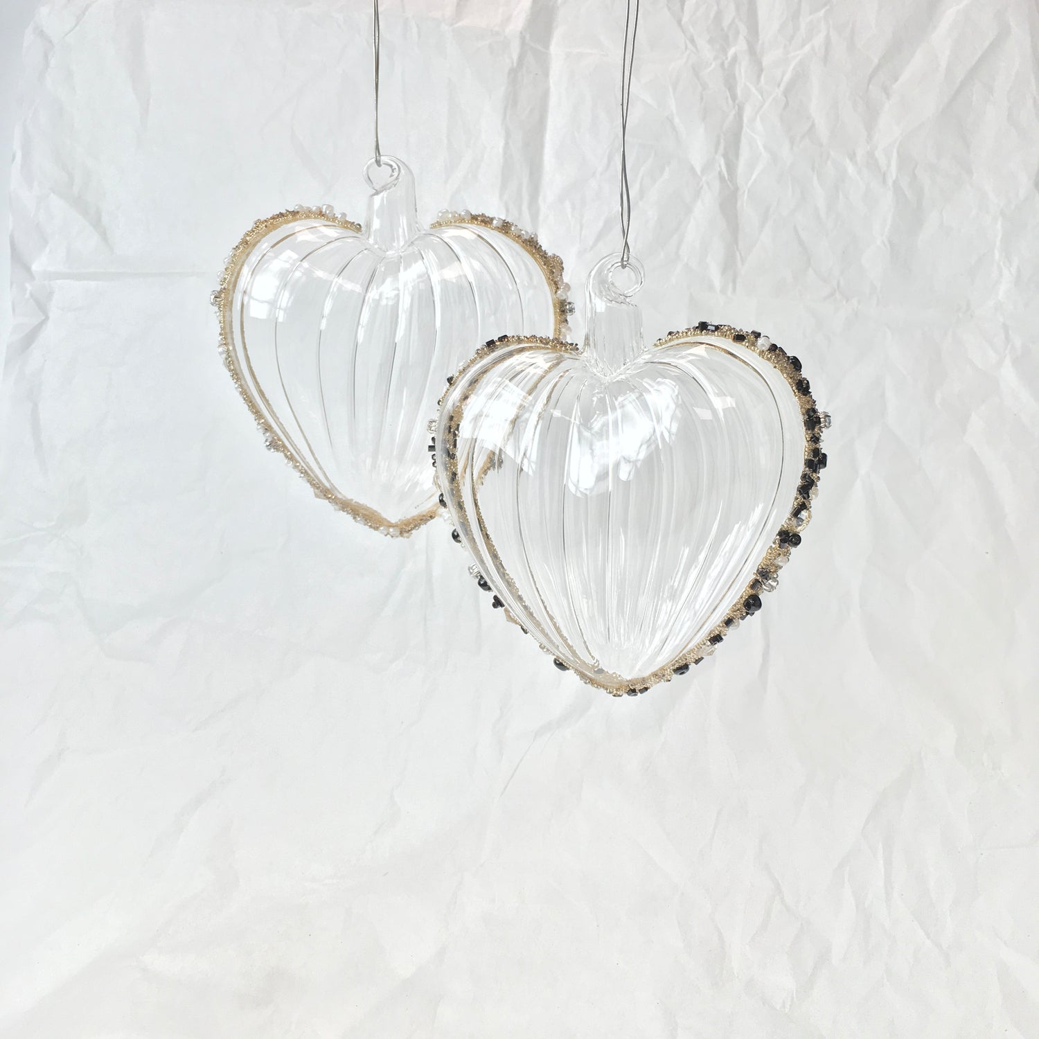 Hand-blown glass heart decorations with white beads for Christmas, Valentines Day and love themed decorating