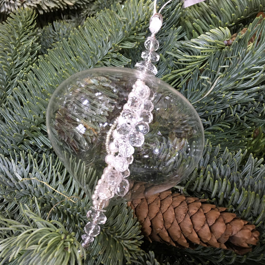 This clear glass sultan decoration is filled with strings of clear, silver and pearl beads to sparkle on a Christmas tree.