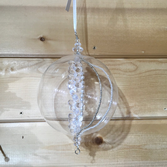 Two sizes of glass sphere decorations with strings of clear, silver and pearl beads