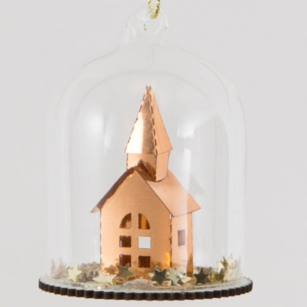 Beautiful decoration featuring a lovely church surrounded by miniature copper stars that move when shaken.