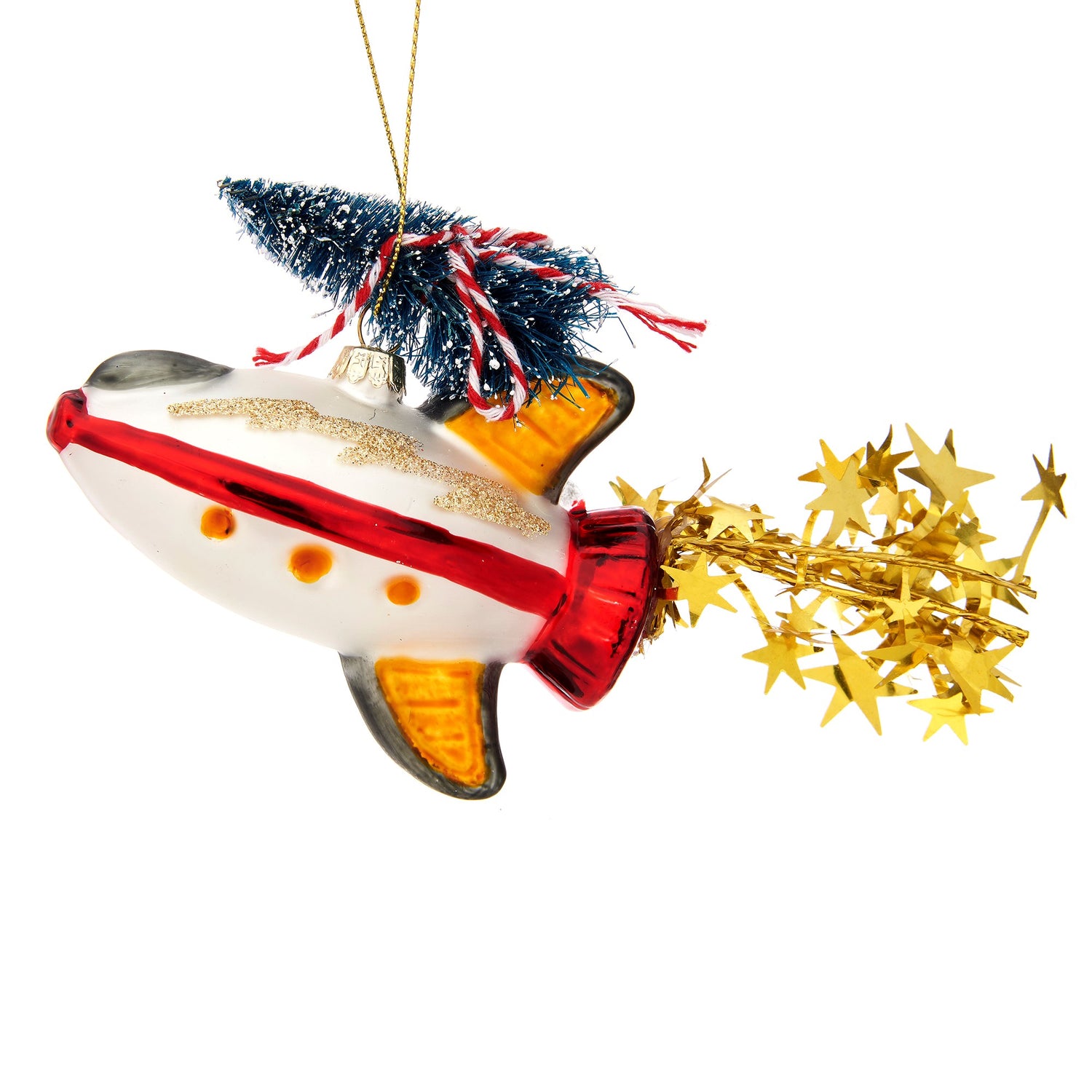 A red and silver rocket carrying a Christmas tree Christmas decoration.