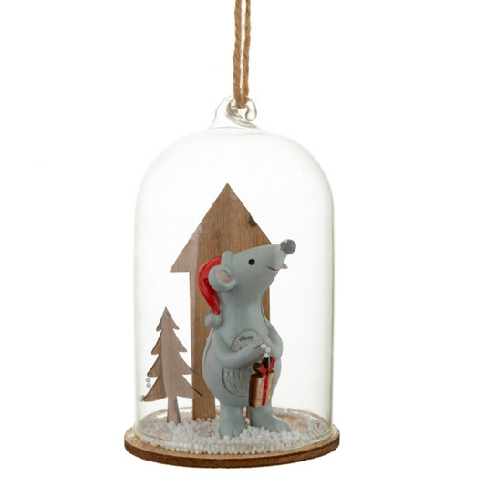 A Christmas hat wearing mouse holding a gift in a woodland scene with miniature snowballs, encapsulated by a glass dome!
