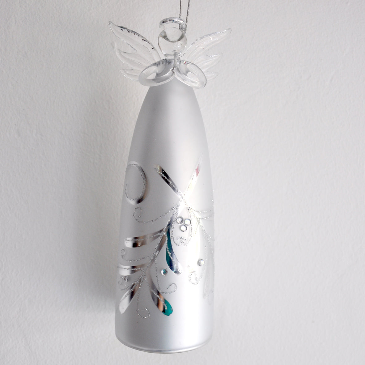 This striking silver angel is made from glass and has a classic mistletoe design on her front.