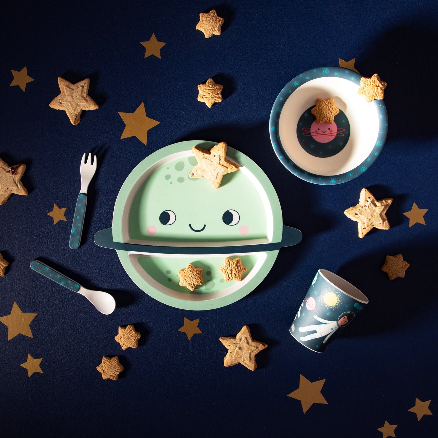 Explore space with this bamboo tableware and cutlery set in a midnight blue with neon bursts colour way, in a fun space explorer themed design.