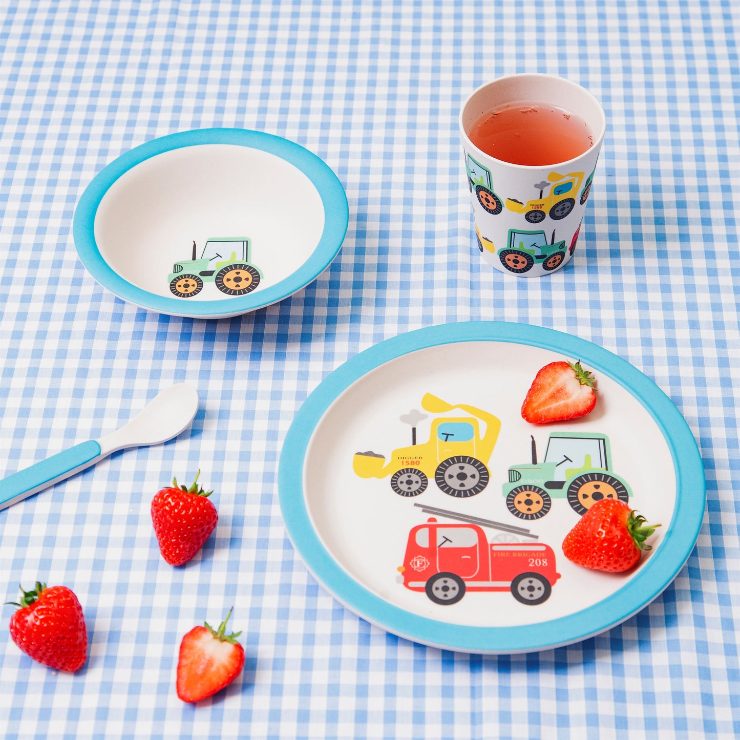 Fun and educational bamboo tableware and cutlery set in a primary colour based transport themed design featuring a tractor, digger and fire engine.
