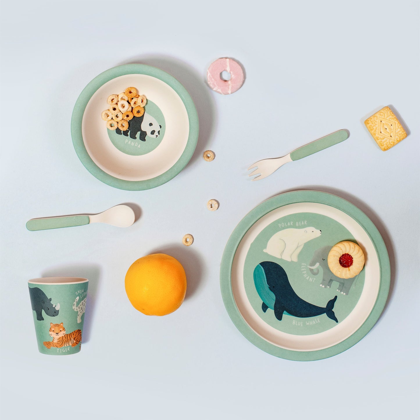 Love our animals with this bamboo tableware and cutlery set featuring a green/blue and white design with various endangered animals.