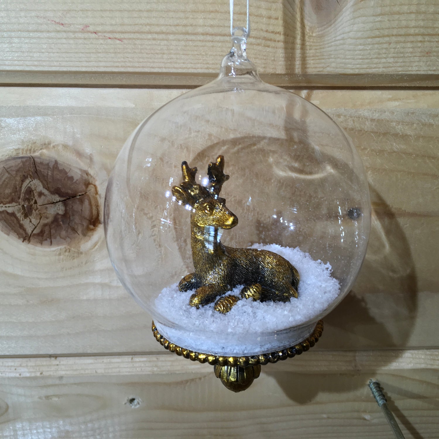 Dark gold stag deer Christmas tree decoration with snow