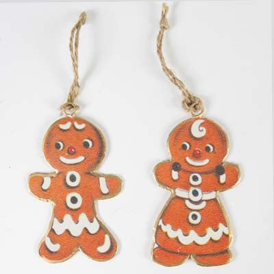Kitsch pair of gingerbread girl and boy metal double sided christmas tree decorations.