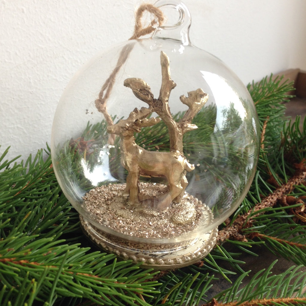 Christmas tree decoration gold stag in a glass dome bauble with glitter inside hanging ornament