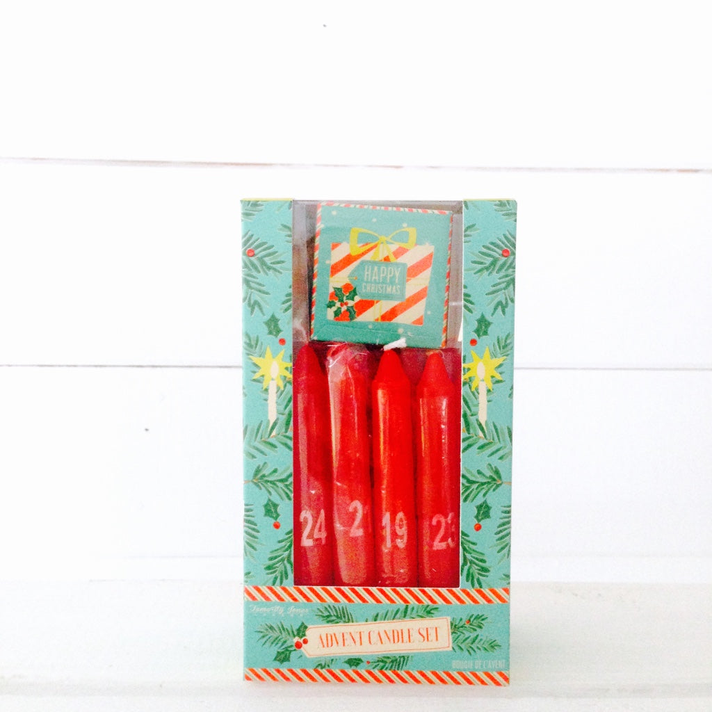 Retro red advent candle set, comes with 24 numbered candles and a stand to burn each one in.