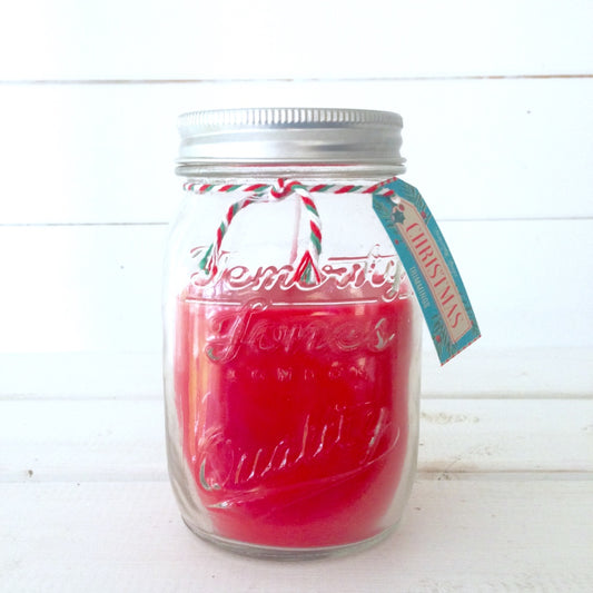 This red scented candle in a mason jar will fill the home with sweet fruity Christmas scent, perfect for adding some festive cheer and table decoration.