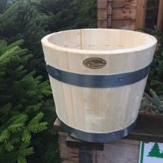 Classic Christmas tree stand natural wooden barrel is suitable for up to a 7ft tree, with metal insert and secure bolts, which holds water.